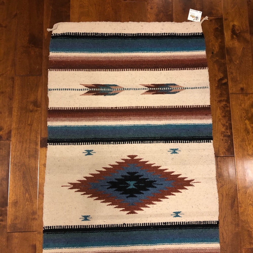 Artisinal hand woven wool rug